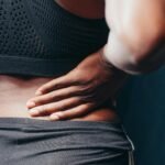 Dor nas costas no começo do ano: causas e soluções práticas